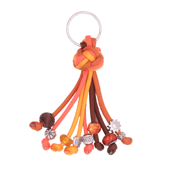 Schlüsselanhänger mit Charms in orange-braun von Antjes Paracord